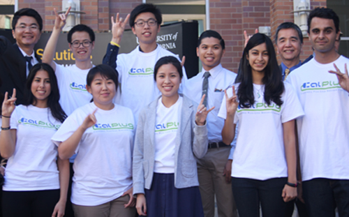 CalPlug manager Arthur Zhang (back left) and Calit2 Irvine Director GP Li (back right) join CalPlug student researchers in show of team pride with a group Rip 'Em Eaters hand sign.