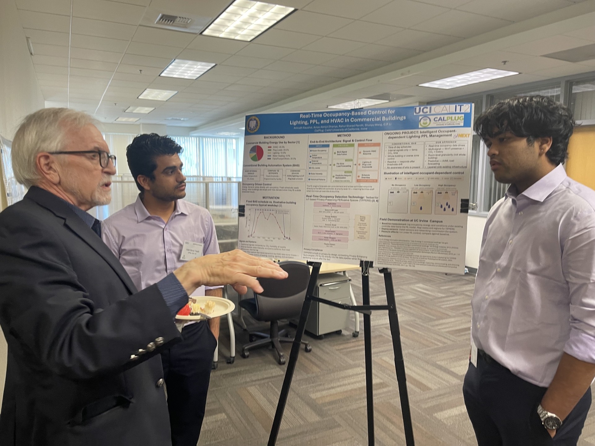 Students presenting poster